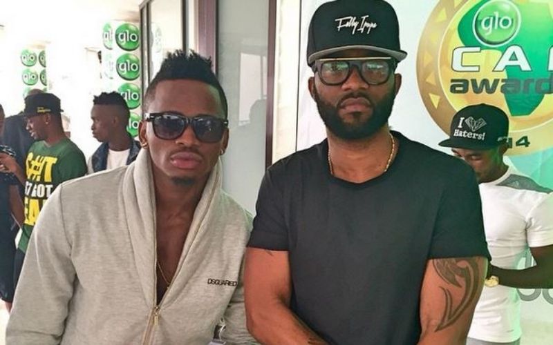 Flavour quand la star jette des fleurs à Fally Ipupa et Diamond Platnumz