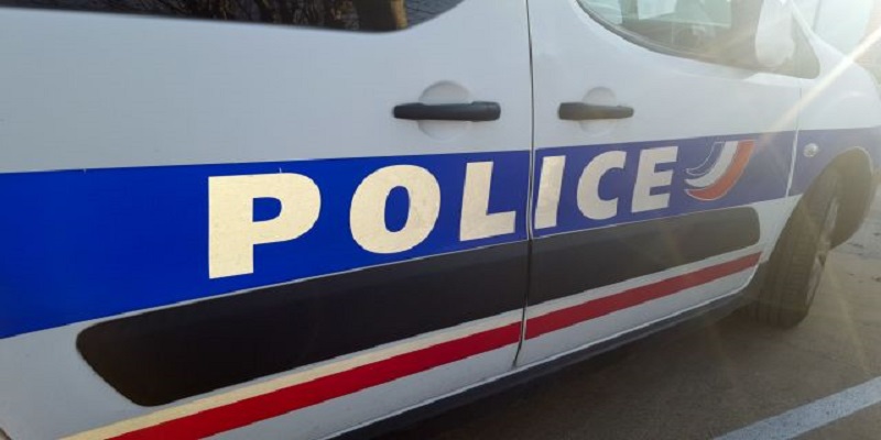 detail of french police car with sun in summer day