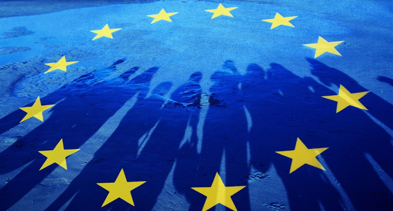 Flag of European Union with silhouette of people