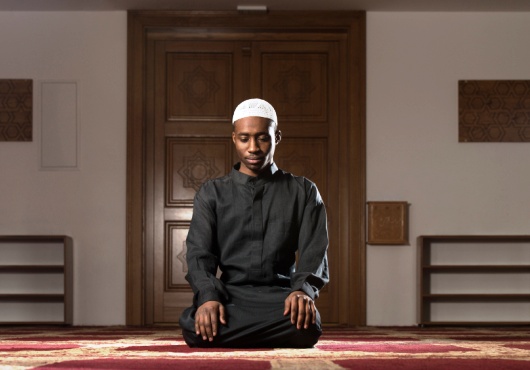 African Muslim Man Is Praying In The Mosque