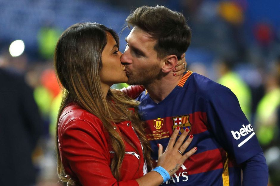 FILE - In this Sunday, May 22, 2016 file photo, Barcelona's Lionel Messi kisses his wife Antonella Roccuzzo as they celebrate after winning the final of the Copa del Rey soccer match between FC Barcelona and Sevilla FC at the Vicente Calderon stadium in Madrid. Cristiano Ronaldo and Lionel Messi put up impressive numbers, in life and on the field, going into a fourth World Cup for each. So much has happened for football's standout stars since the 2014 tournament left both still lacking the game's most coveted prize. (AP Photo/Francisco Seco, File)/FP108/18135523526284/SUNDAY, MAY 22, 2016 FILE PHOTO/1805181004